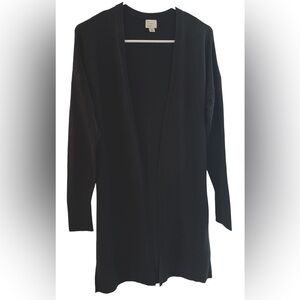 Black knee length cardigan sweater with attached belt in the back. Size M